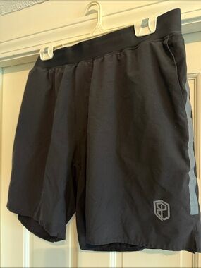 Born primitive men’s running Shorts with Reflective Trim built in linear
